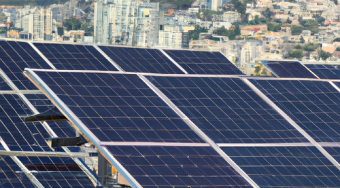 City landscape with multiple solar panels, photo